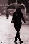 Women walking in rain