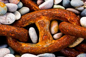 Rusty chain on seacoast Rusty chain on seacoast
